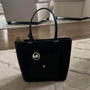 Micheal Kors black leather purse.